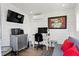 Modern home office with sleek desk, ergonomic chair, and minimalist decor at 4649 Neptune Se Dr, St Petersburg, FL 33705