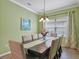 Formal dining room with a chandelier, and room for seating for eight or more people at 5401 Match Point Pl, Lithia, FL 33547