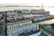 Elevated view showcases waterfront condo living near the marina and tennis court in a serene environment at 6060 Shore S Dr # 906, Gulfport, FL 33707