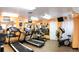 Enjoy a full fitness center with treadmills and elliptical machines in a well-lit space at 6060 Shore S Dr # 906, Gulfport, FL 33707