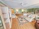 Bright living room with a neutral color scheme, open floor plan, and dining area with room to relax at 6060 Shore S Dr # 906, Gulfport, FL 33707