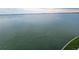 Expansive view of the water and shoreline with natural light and peaceful surroundings at 6060 Shore S Dr # 906, Gulfport, FL 33707