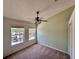 Bedroom featuring neutral carpet and view from windows at 608 Black Lion Ne Dr, St Petersburg, FL 33716