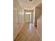 Inviting foyer with tile flooring, closet, and storm door with natural light at 608 Black Lion Ne Dr, St Petersburg, FL 33716