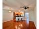 Open living space that seamlessly combines the living area, dining space, and a well-equipped kitchen at 608 Black Lion Ne Dr, St Petersburg, FL 33716