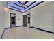 Spacious bedroom with tile flooring and custom lighting at 6534 Simone Shores Cir, Apollo Beach, FL 33572