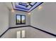 A bright bedroom features a window and tile flooring at 6534 Simone Shores Cir, Apollo Beach, FL 33572