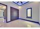 A bright room featuring recessed lighting, modern ceiling fan, and a large window with LED accent lighting at 6534 Simone Shores Cir, Apollo Beach, FL 33572