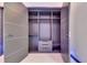 A spacious walk in closet featuring shelves, drawers and LED accent lighting at 6534 Simone Shores Cir, Apollo Beach, FL 33572