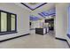 An open floor plan that showcases living room, kitchen and dining area with bright recess lighting at 6534 Simone Shores Cir, Apollo Beach, FL 33572