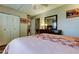 Bedroom provides ample closet space and tranquil views of the surrounding area at 700 Starkey Rd # 1216, Largo, FL 33771