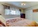 Relaxing bedroom features a closet, dresser, and serene window lighting at 700 Starkey Rd # 1216, Largo, FL 33771