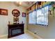 Bonus room with a faux fireplace, window view, and decorative display at 700 Starkey Rd # 1216, Largo, FL 33771