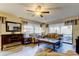 Bright living room offers ample seating, sleek floors, and natural light from the windows at 700 Starkey Rd # 1216, Largo, FL 33771