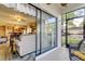 This screened porch connects seamlessly with the living area, and offers views to the backyard and carport at 700 Starkey Rd # 1216, Largo, FL 33771