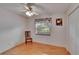 Clean, bright bedroom with wood floors, large window and closet at 905 Balsamina Dr, Brandon, FL 33510