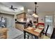 Open kitchen with light wood cabinets flows into the dining area and living space, ideal for entertaining at 905 Balsamina Dr, Brandon, FL 33510