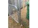 Chain link gate to the backyard at 9307 N 16Th St, Tampa, FL 33612