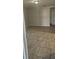 Bright living area with neutral wall and tiled floors, ideal for entertaining guests at 9307 N 16Th St, Tampa, FL 33612