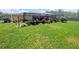 The backyard features lush green grass and a well-maintained outdoor space at 7535 Cypress Knoll Dr, New Port Richey, FL 34653