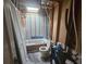 Bathroom under construction with exposed plumbing, toilet, and shower at 7535 Cypress Knoll Dr, New Port Richey, FL 34653