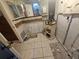 Bathroom with exposed wiring and plumbing in need of renovation at 7535 Cypress Knoll Dr, New Port Richey, FL 34653