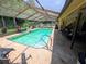 Screened-in pool and patio area for outdoor relaxation and enjoyment of the Florida sunshine at 7535 Cypress Knoll Dr, New Port Richey, FL 34653