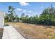 Backyard featuring mature trees and shrubbery at 3300 52Nd N St, St Petersburg, FL 33710