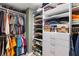 Organized walk-in closet with ample shelving, hanging space, and drawer storage at 10596 Lake Seminole Ter, Seminole, FL 33772