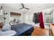 Bedroom with ceiling fan, hardwood floors, and natural light at 1120 43Rd N Ave, St Petersburg, FL 33703