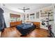 Bedroom featuring hardwood floors, ceiling fan and bright natural light at 1120 43Rd N Ave, St Petersburg, FL 33703