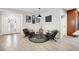 Inviting living room featuring modern decor, tile flooring, and direct access to other living areas at 1120 43Rd N Ave, St Petersburg, FL 33703