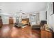 Bright, expansive main bedroom with wood floors, large windows, and a cozy sitting area for relaxation at 1120 43Rd N Ave, St Petersburg, FL 33703