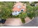 Aerial view of a beautiful townhome community with manicured lawns and a red tile roof at 1122 Shipwatch Cir, Tampa, FL 33602