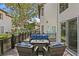 Back deck with outdoor seating and a cozy fire table at 1122 Shipwatch Cir, Tampa, FL 33602