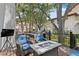 Outdoor deck with grill, lounge seating, and outdoor TV at 1122 Shipwatch Cir, Tampa, FL 33602