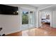 Bedroom featuring an outside view through a sliding glass door to balcony and connected to the bathroom at 1122 Shipwatch Cir, Tampa, FL 33602