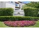 Entrance to Harbour Homes featuring lush landscaping and beautiful flowers at 1122 Shipwatch Cir, Tampa, FL 33602