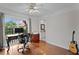Bright home office with hardwood floors and a view of the yard at 1122 Shipwatch Cir, Tampa, FL 33602