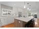 Bright kitchen featuring modern cabinetry, stainless steel appliances, and a large center island at 1122 Shipwatch Cir, Tampa, FL 33602