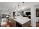 Open kitchen layout with island seating, stainless steel appliances, and ample counter space at 1122 Shipwatch Cir, Tampa, FL 33602
