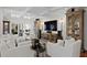 Bright and airy living room featuring neutral decor, coffered ceilings, and large windows at 1122 Shipwatch Cir, Tampa, FL 33602