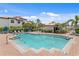 Spacious community swimming pool area with ample lounge seating, lush landscaping, and clear blue refreshing water at 1122 Shipwatch Cir, Tampa, FL 33602