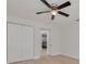 Bedroom featuring a closet and view into the next room at 11296 115Th St, Largo, FL 33778