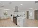 Stylish kitchen with white cabinets, marble countertops, stainless steel appliances, and an open layout perfect for entertaining at 11296 115Th St, Largo, FL 33778
