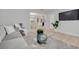Open living space with modern décor flowing into dining area and kitchen for seamless entertaining at 11296 115Th St, Largo, FL 33778