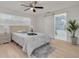 Cozy main bedroom with stylish decor and luxurious bathroom featuring soaking tub for ultimate relaxation at 11296 115Th St, Largo, FL 33778