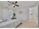 Inviting main bedroom boasting an ensuite bathroom and seamless transition to the open-concept living spaces at 11296 115Th St, Largo, FL 33778