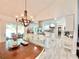 Bright, open kitchen with stainless steel appliances and a center island with barstool seating at 1330 Belcher Dr, Tarpon Springs, FL 34689