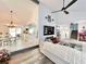Open-concept floor plan with the living room flowing into the kitchen and dining area at 1330 Belcher Dr, Tarpon Springs, FL 34689